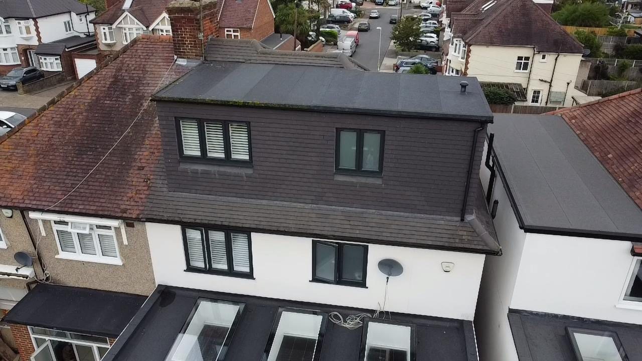 Rear dormer square-on, showing the new windows