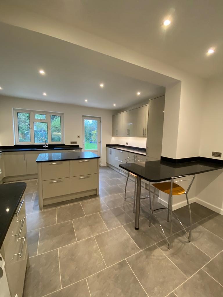 Kitchen with island and garden views, Worcester Park