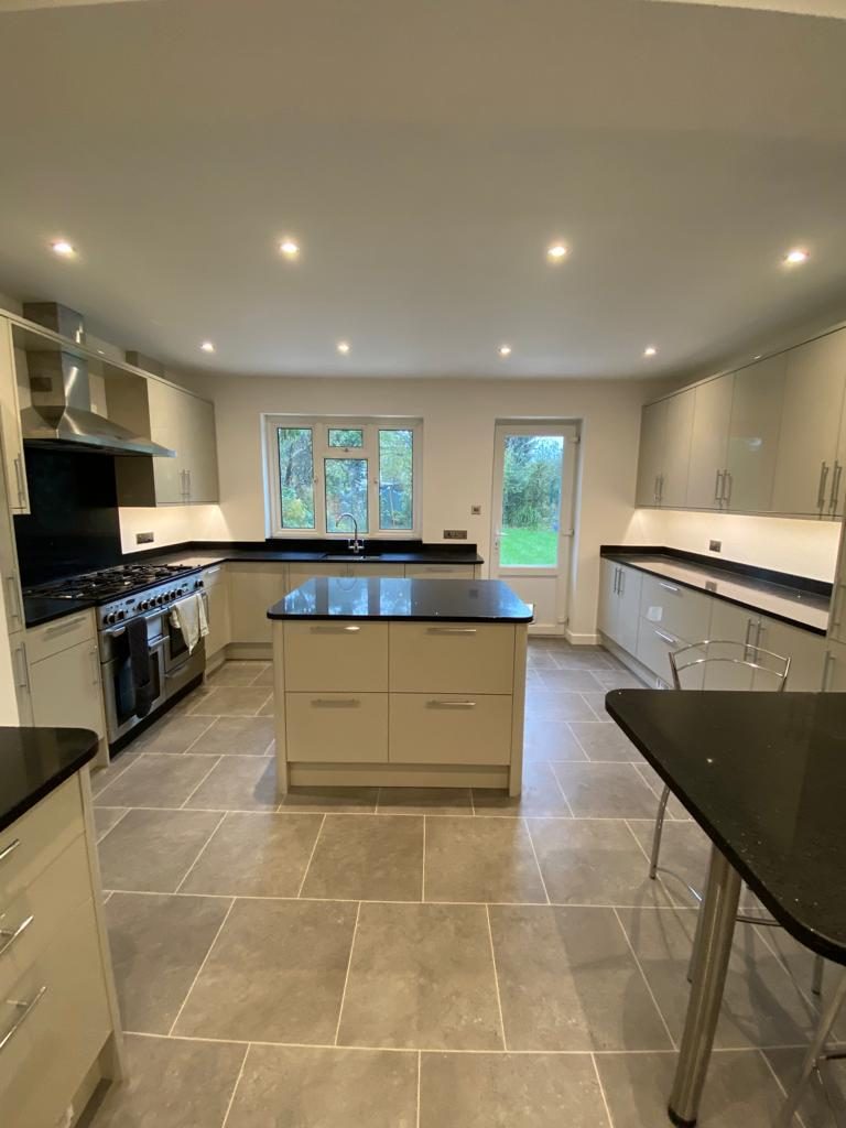 Daylit kitchen with central island and range cooker, Worcester Park