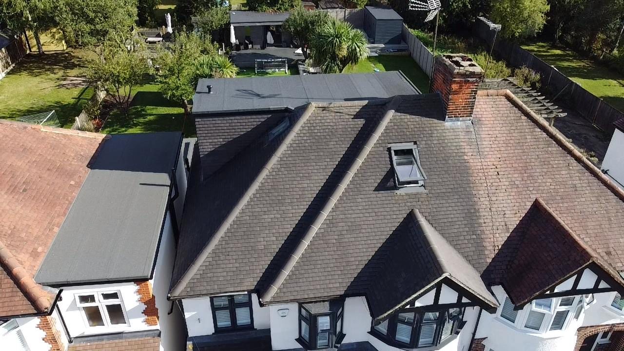 Aerial view of a loft conversion with a new dormer and roof window